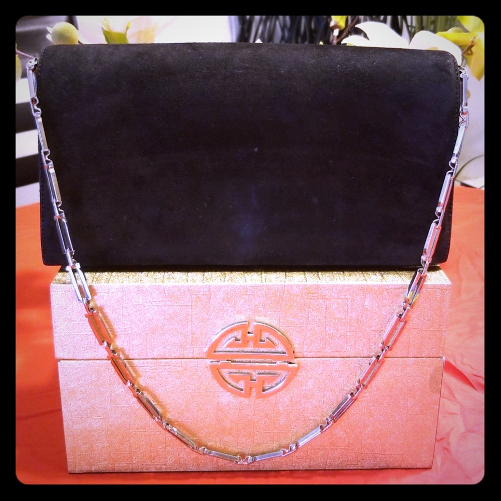 Salvatore Ferragamo black suede purse